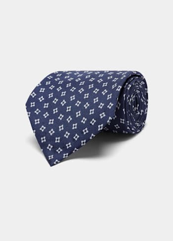 Cravate bleu marine à fleurs
