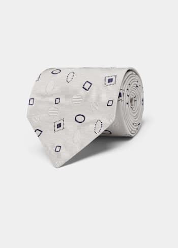 Cravate blanc cassé motif graphique