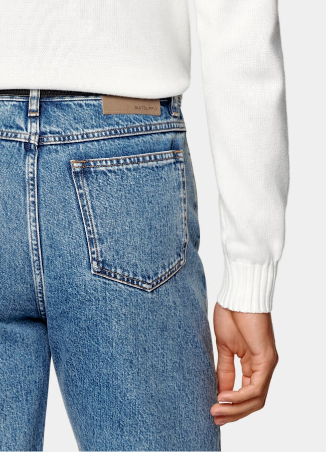 SUITSUPPLY All Season Denim con orillo de Candiani, Italia Vaqueros azul intermedio lavado Straight Leg Tapered