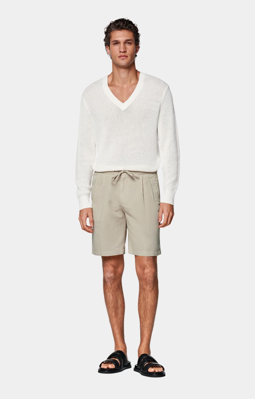 Pull col V en crochet blanc cassé