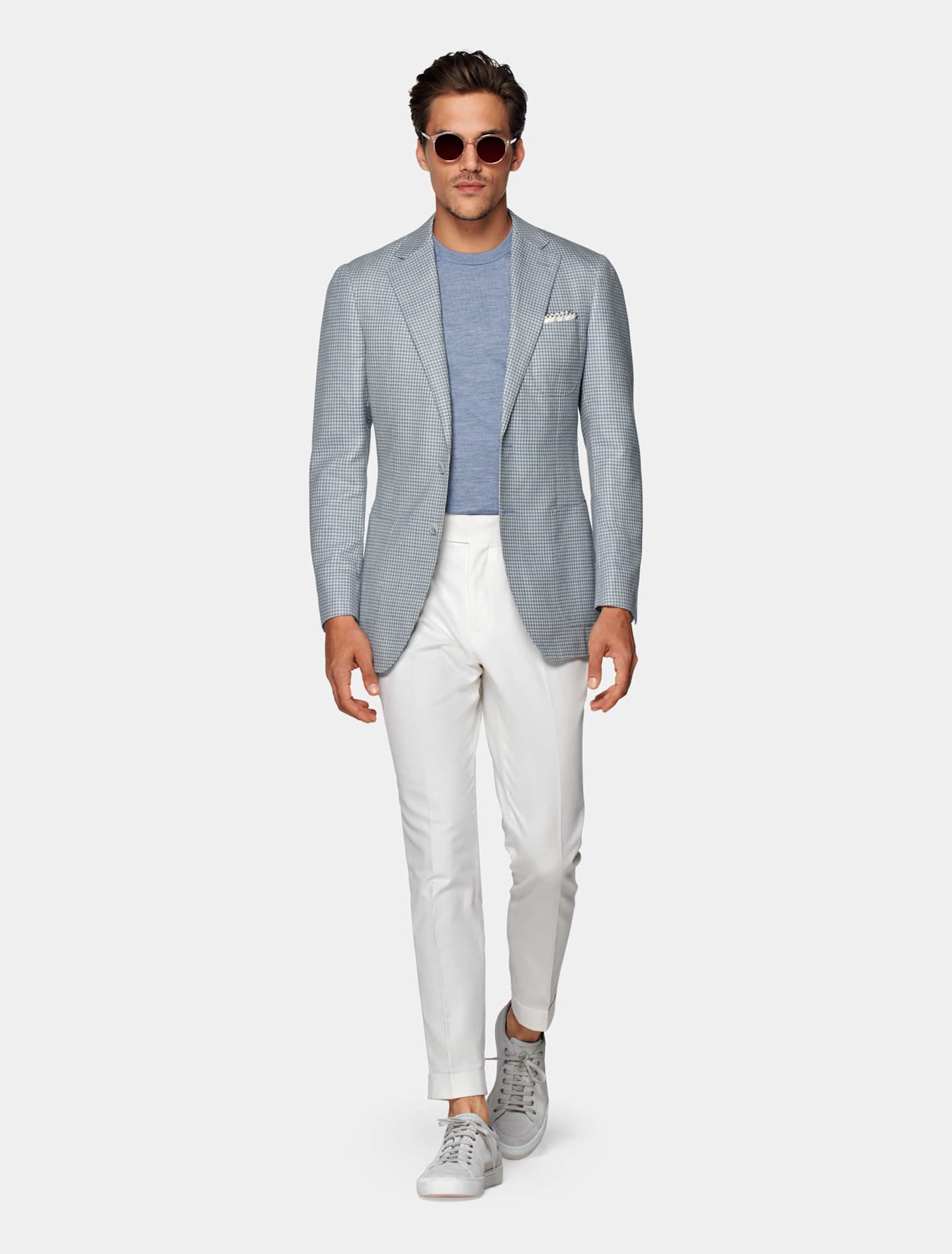 A light blue sharp tailored jacket to complement a smart casual wedding code.