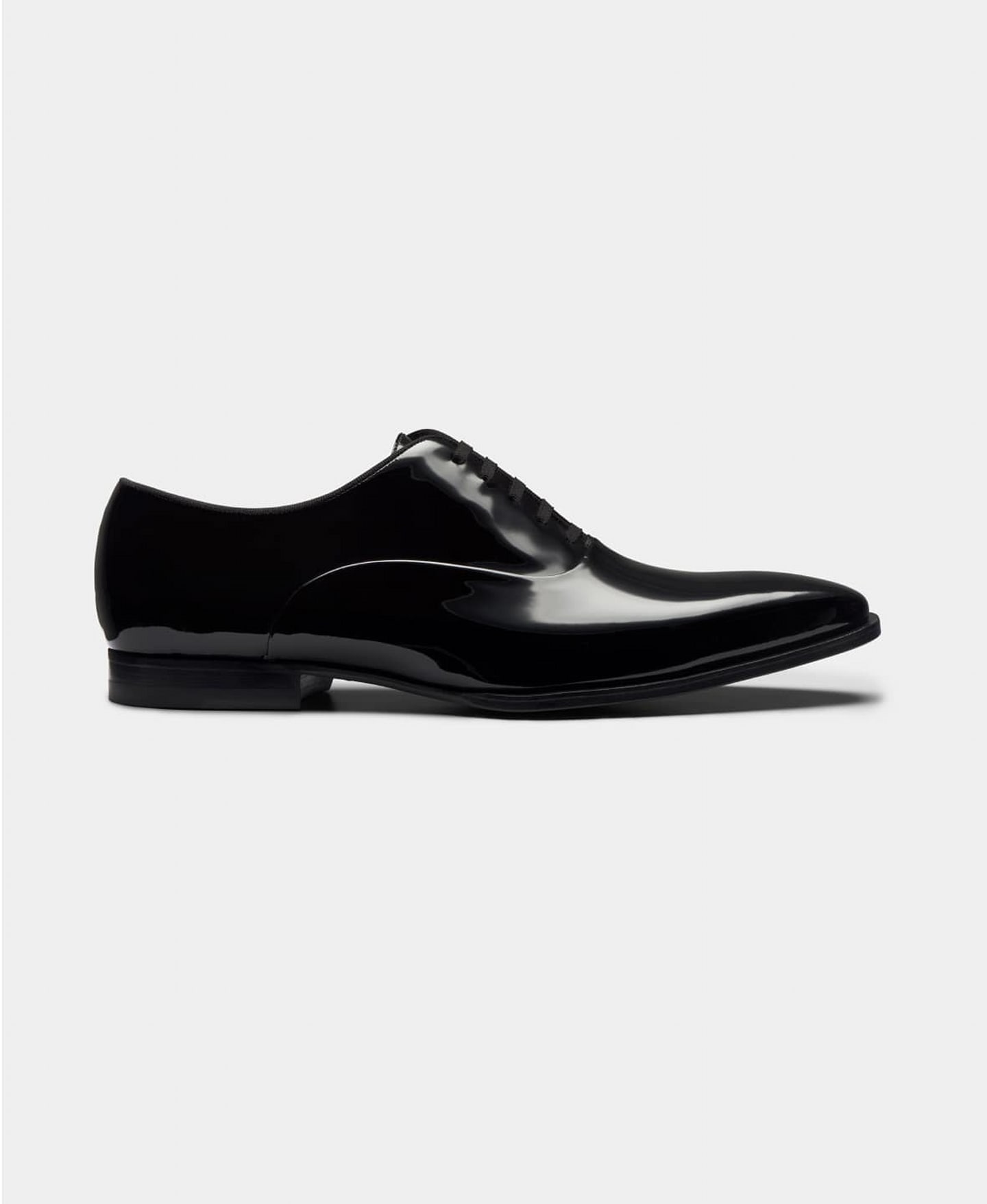 Black patent leather lace-up shoes