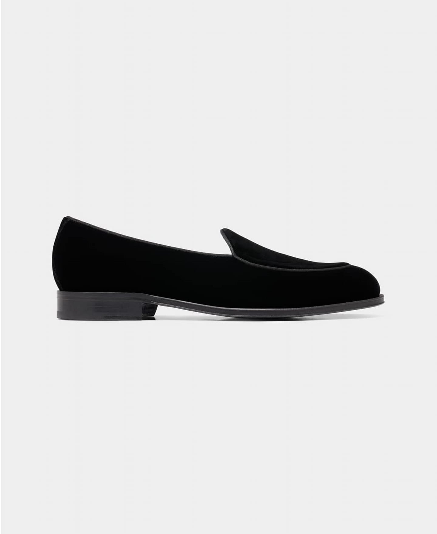Black velvet tuxedo slippers.
