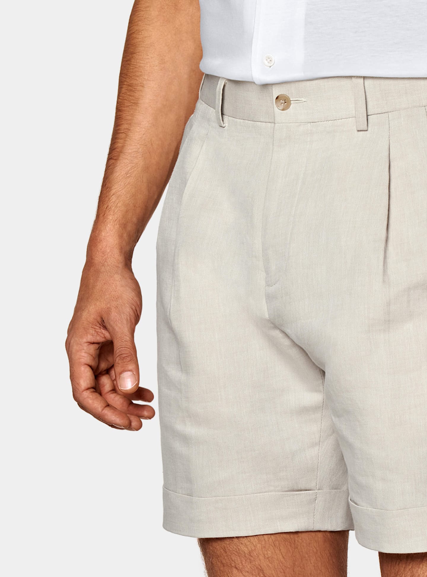 Shorts that can be paired up with a casual blazer or without for a wedding occasion on the beach.