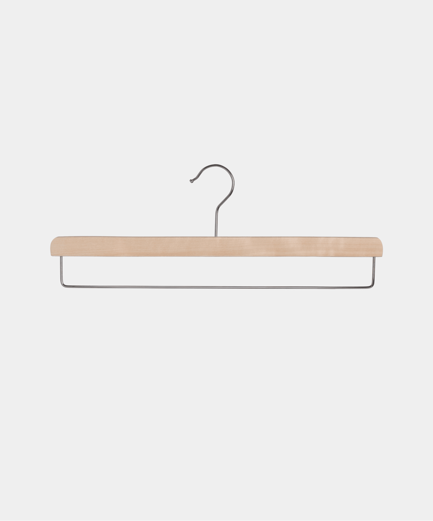 A wooden hanger featuring a sleek metal hook, designed for hanging garments with elegance and durability.