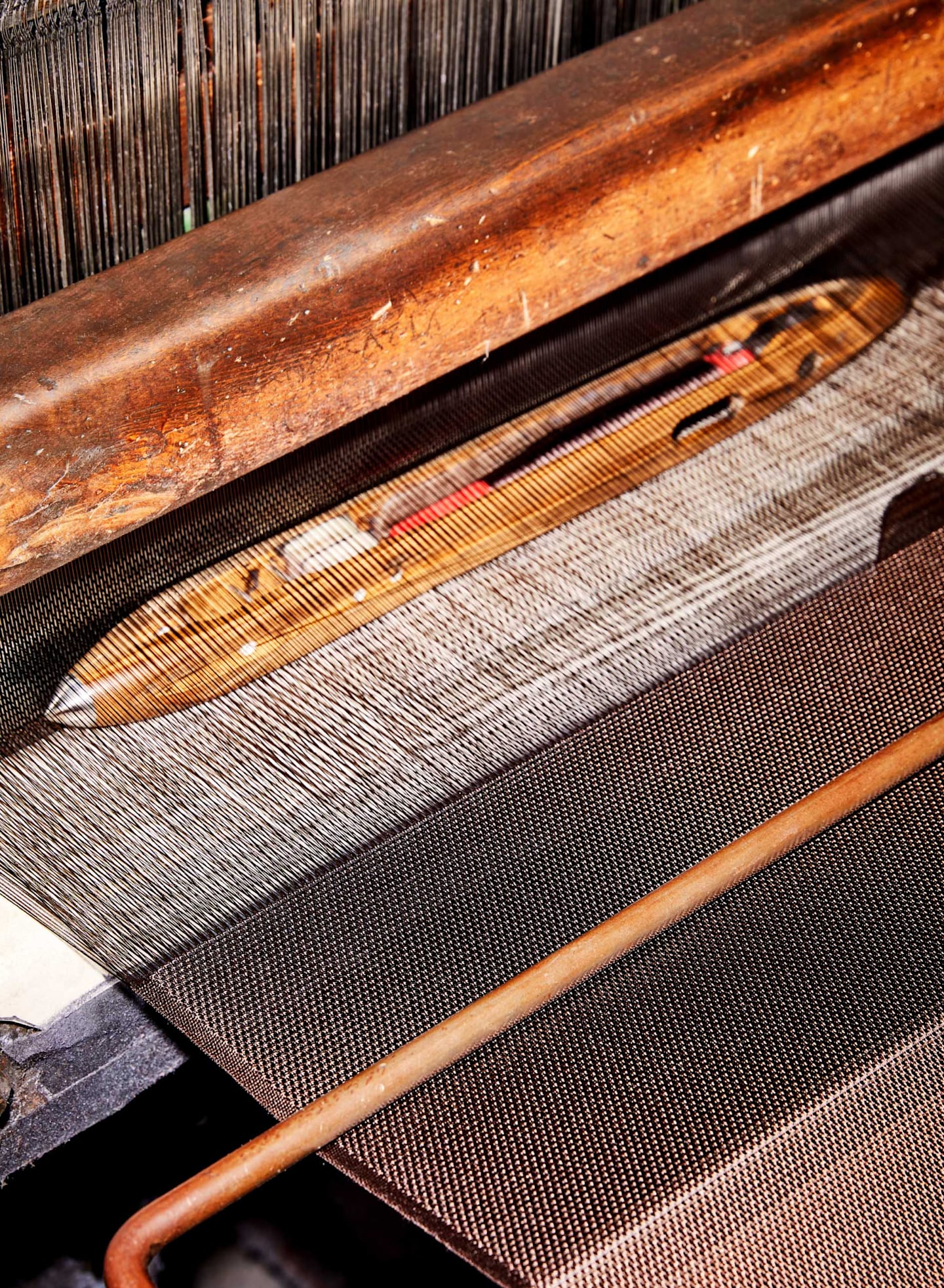 One of the oldest silk loom machines in the world at Fossati Mill in Italy- producing fabric for grenadine ties.