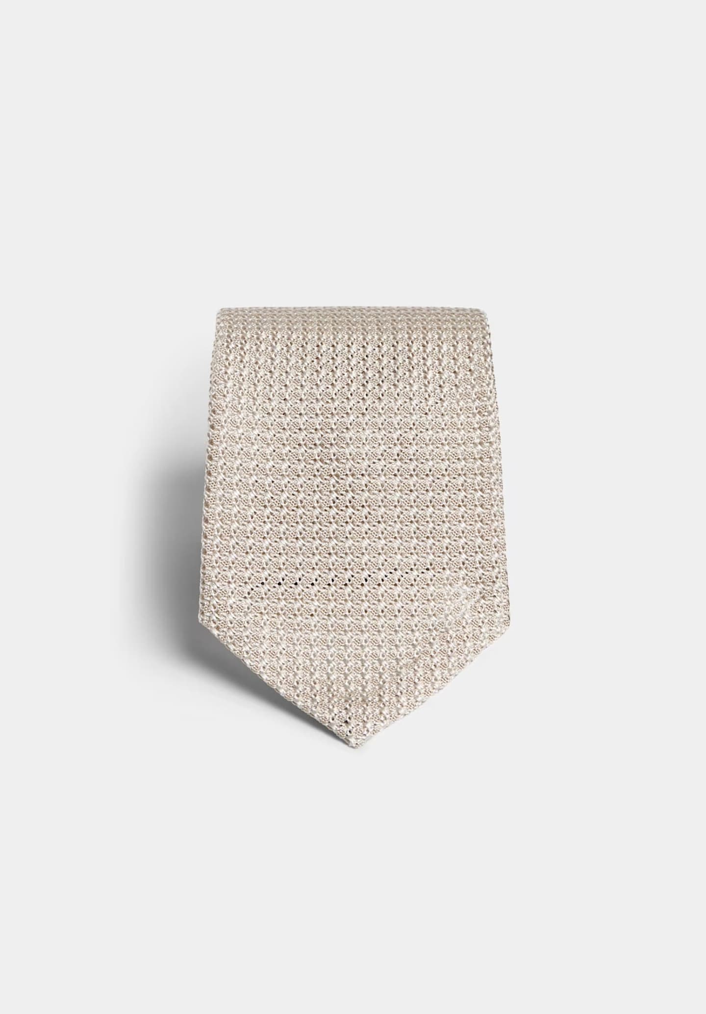 Suitsupply grenadine fabric for light brown silk tie.