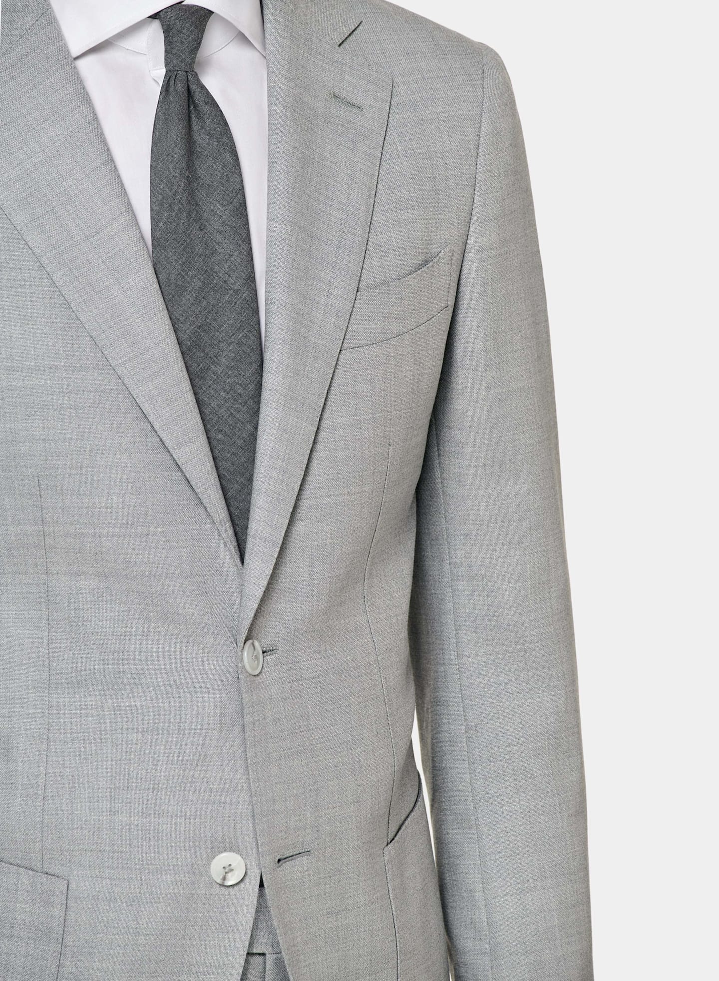 Grey suit jacket worn with white shirt & grey tie