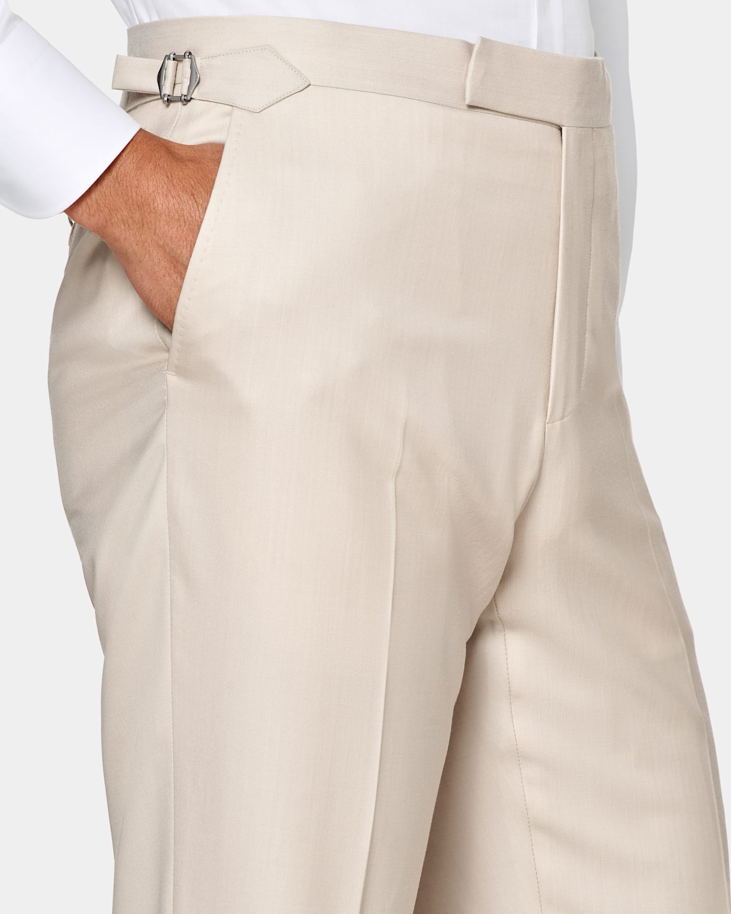 Light brown trousers with side adjusters