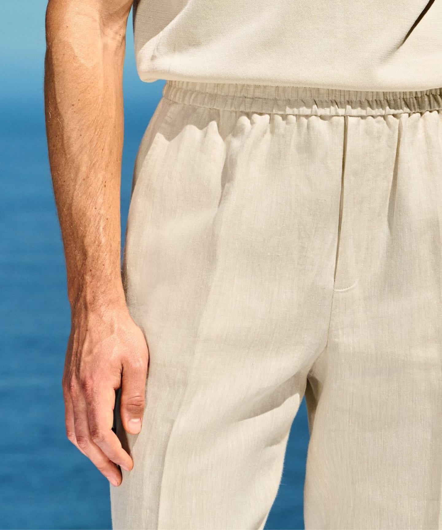 Green linen shirt, detail.