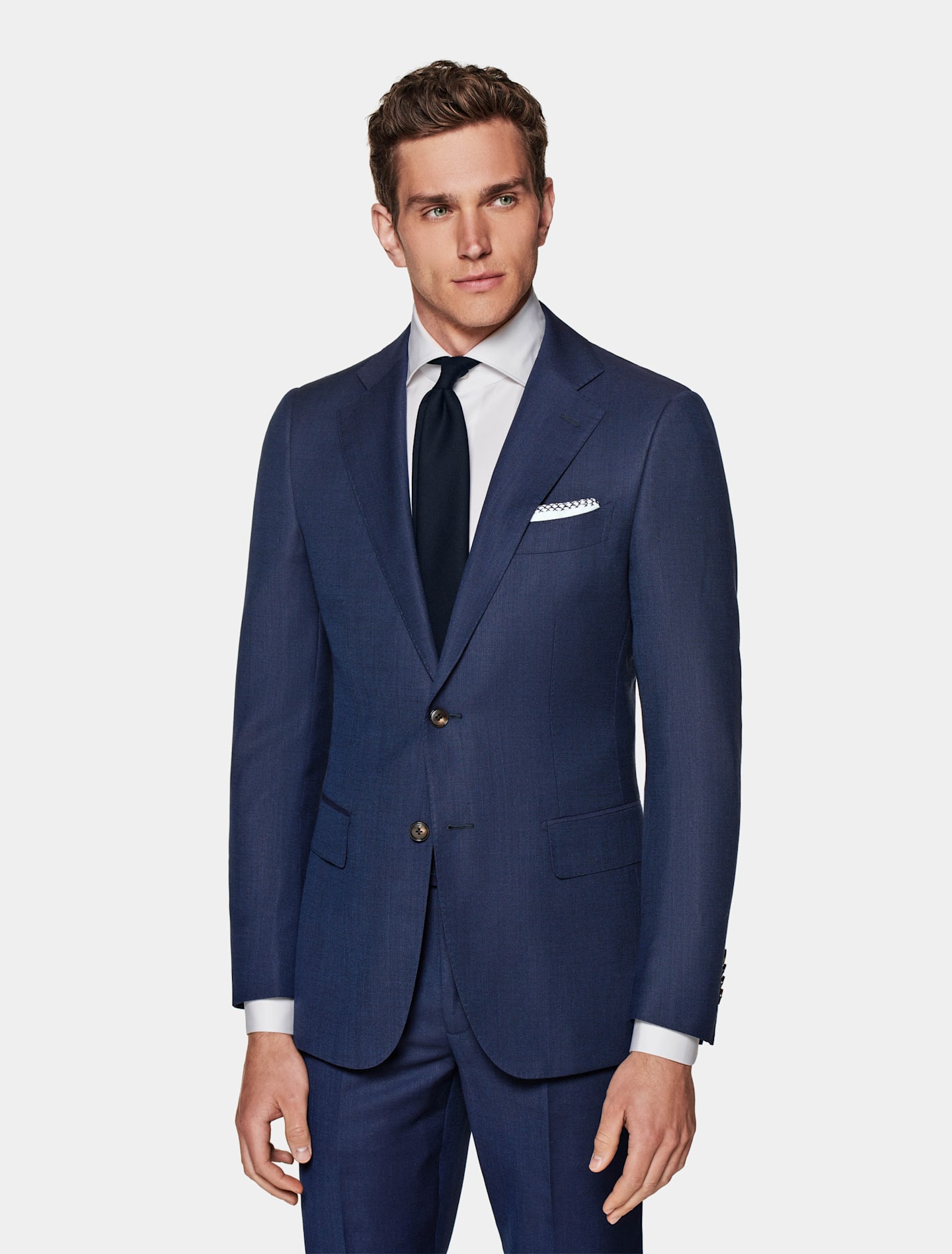 Navy suit for formal occasions, such as weddings and funerals.
