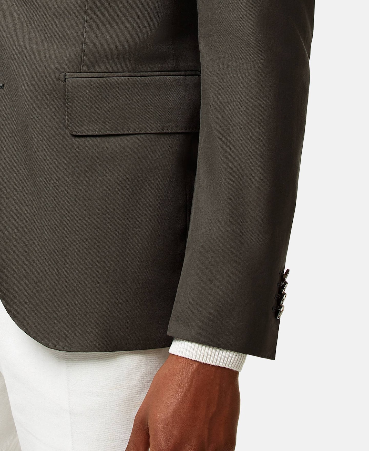 A classic flap pocket that haws fabric stitched to the upper welt.