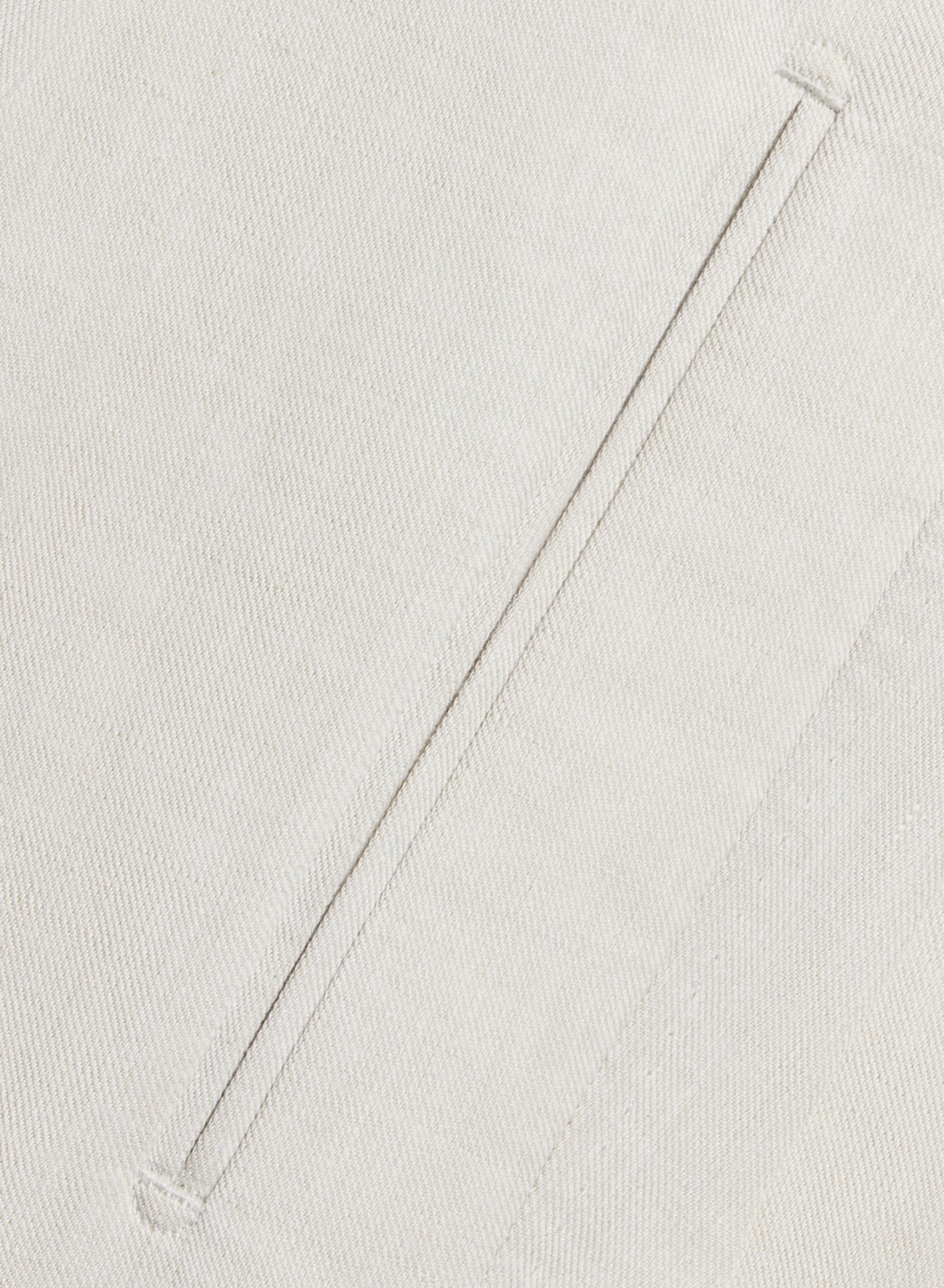 Jetted front pocket, an aesthetic detail on more formal trousers.