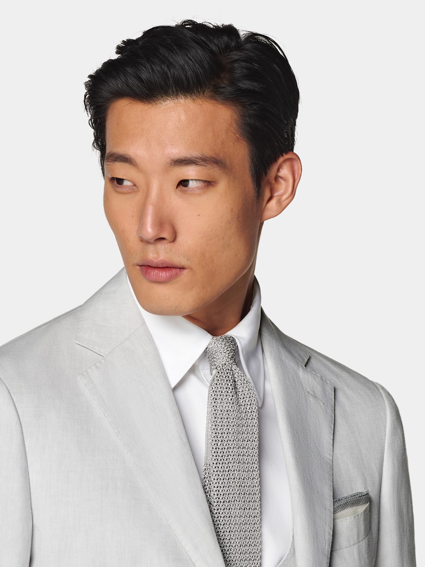 A light grey shade, as in our linen-cotton blend Havana suit brings a little color levity while remaining decidedly formal.