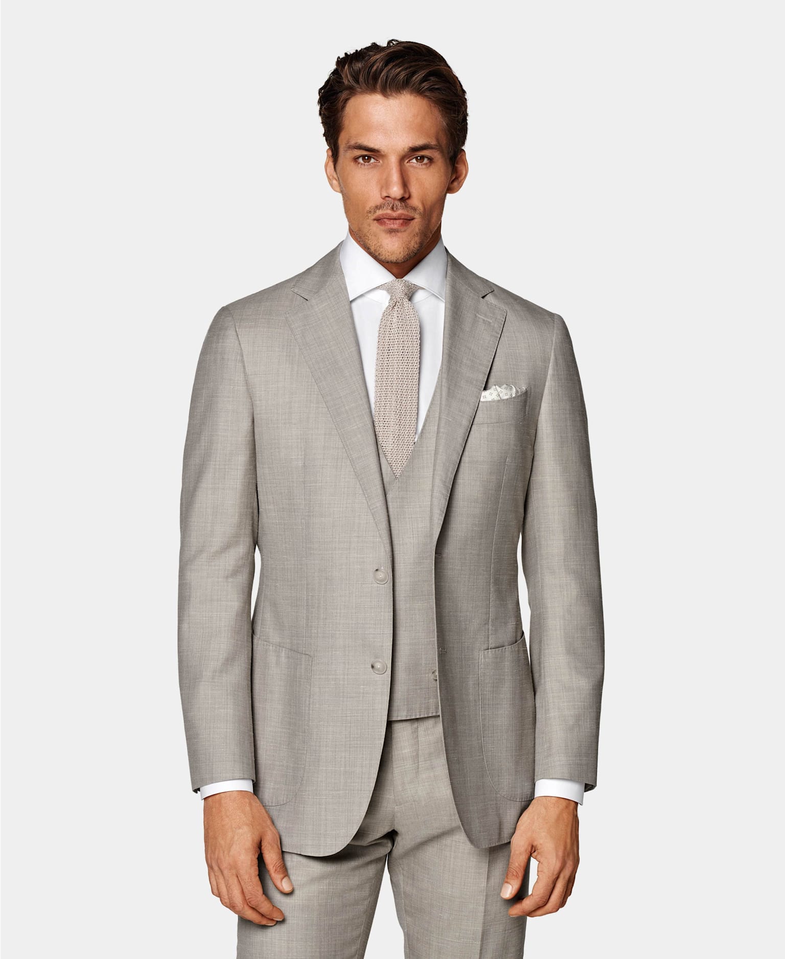 Effortlessly Stylish: Tips on How to Wear a Men's Suit Jacket with