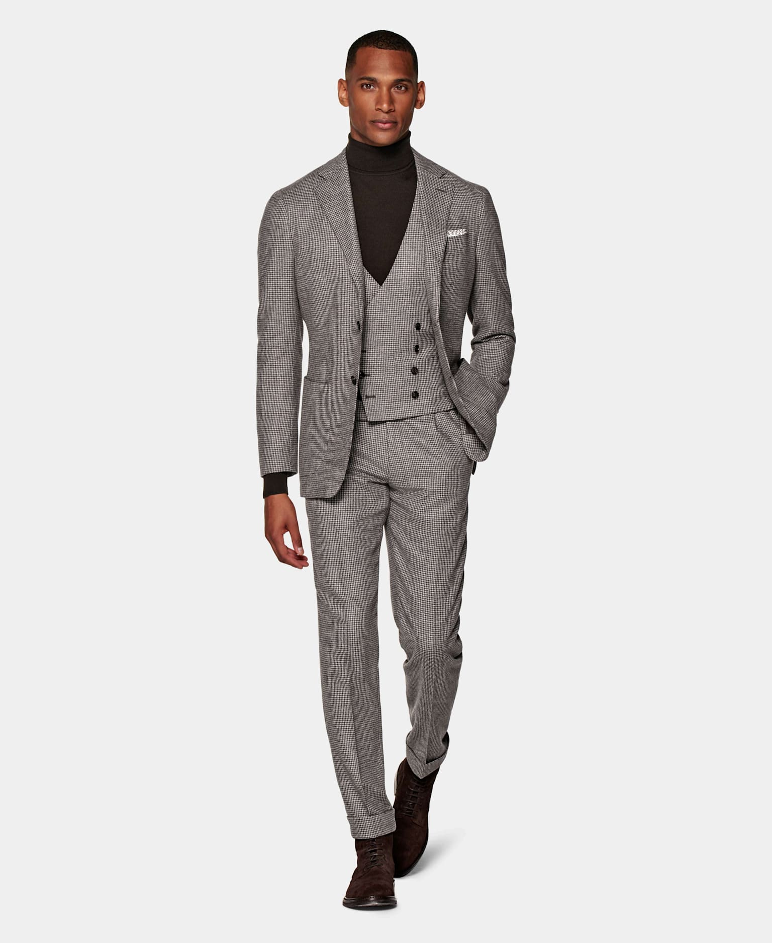A houndstooth check suit for a winter wedding look. 