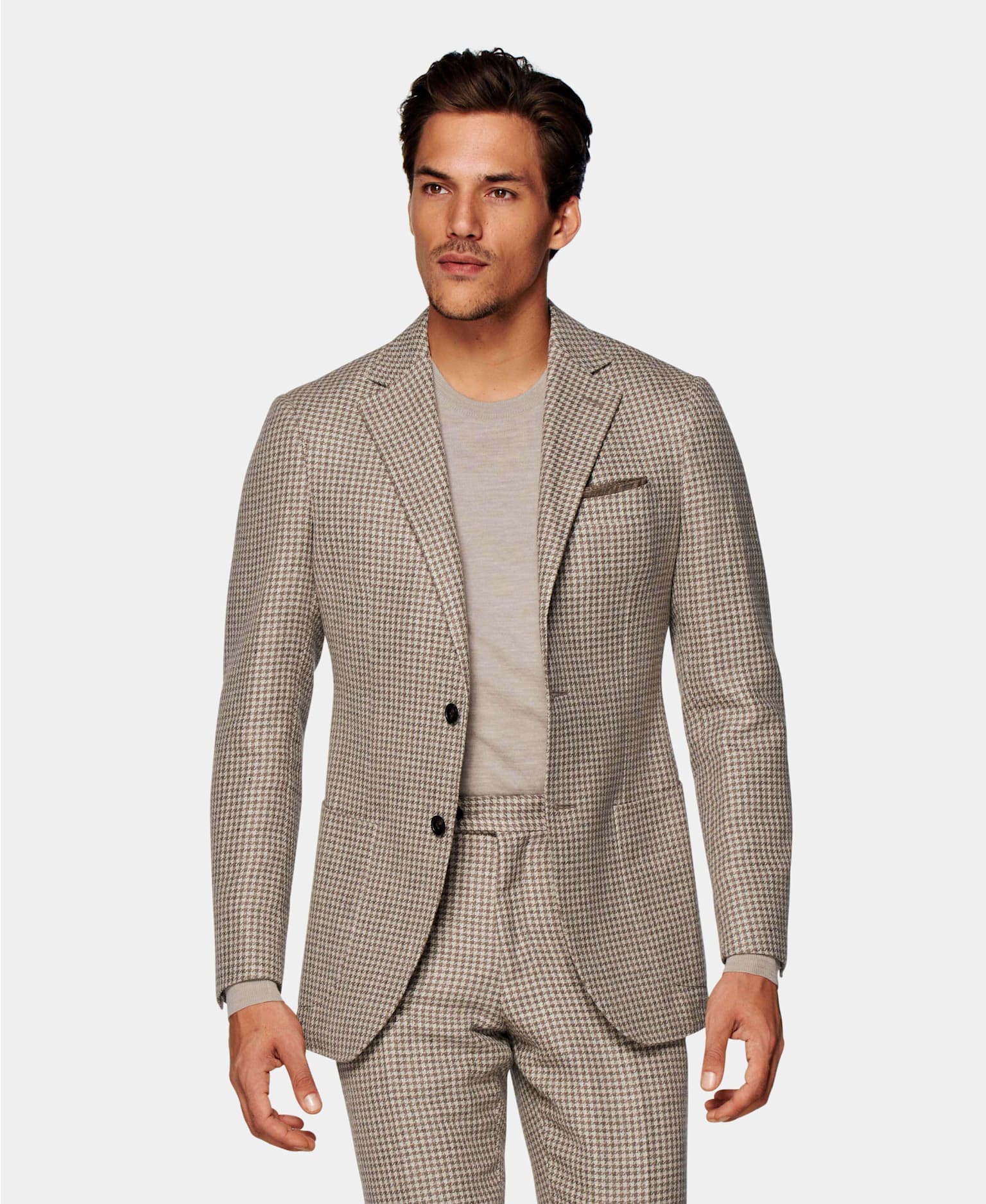 A green houndstooth suit suitable for a winter wedding. 