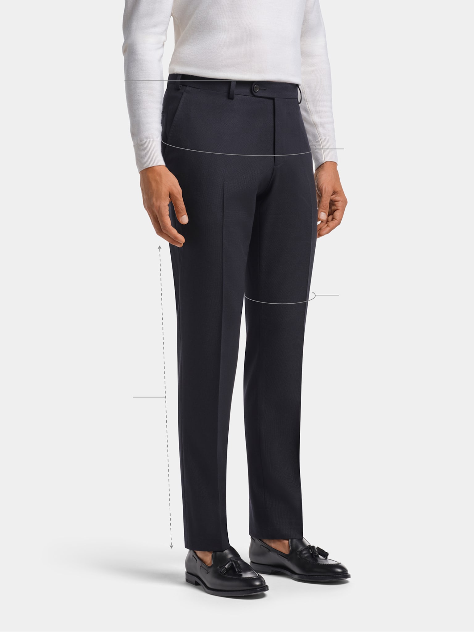 Navy slim, straight fit trousers with white knit and sockless loafers.