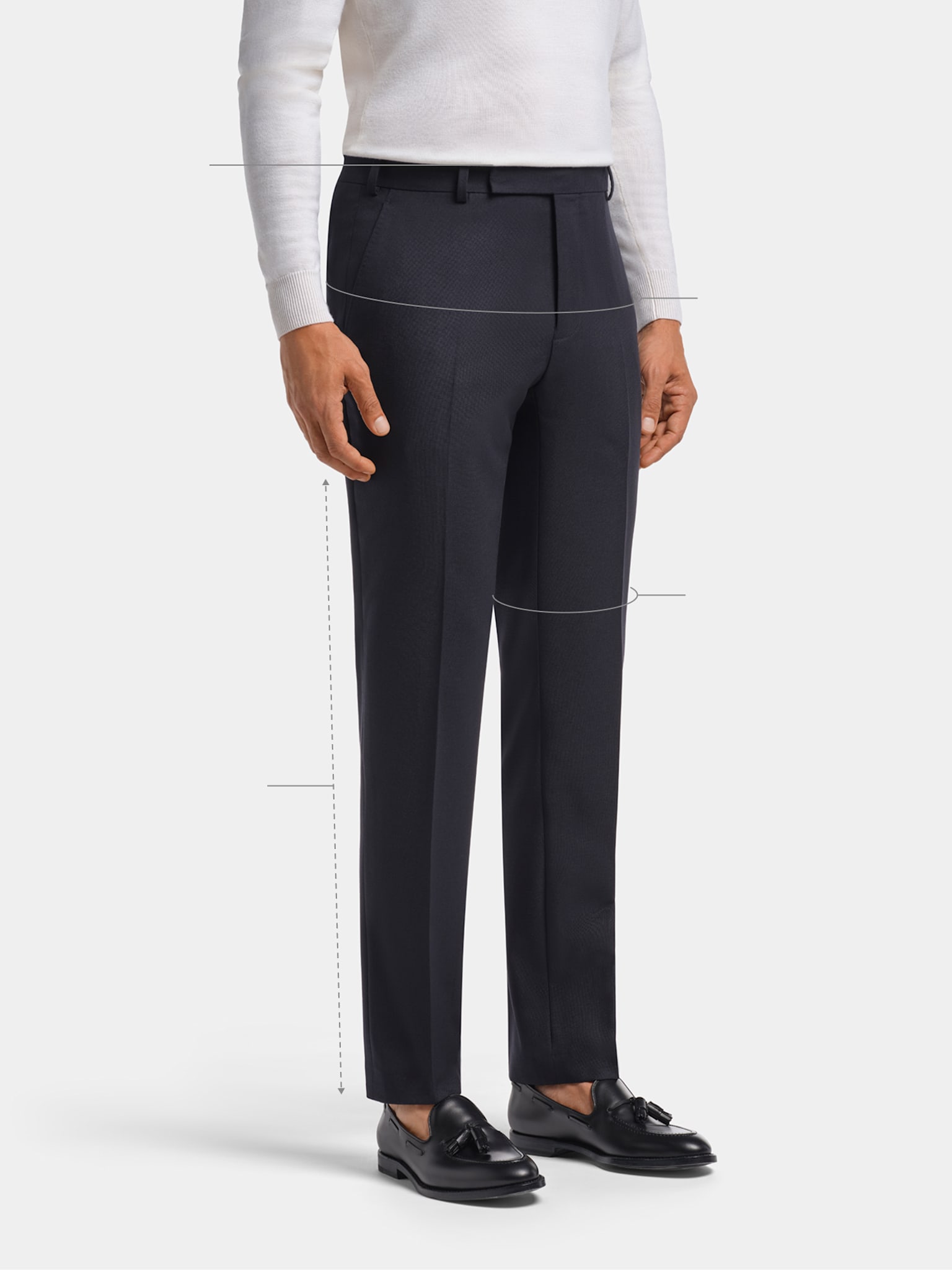 Navy straight fit trousers with white knit and sockless loafers.