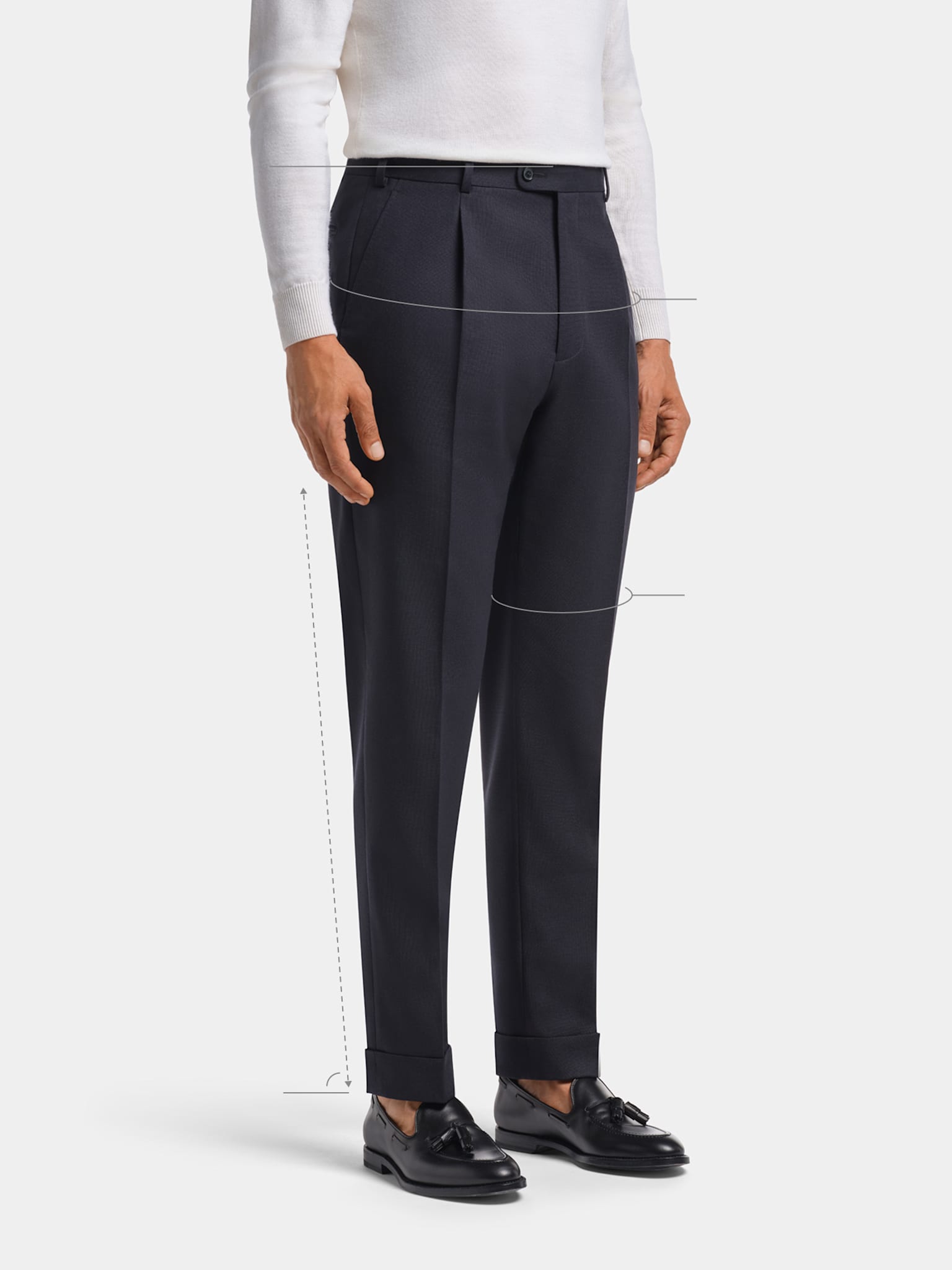 Navy wide, tapered leg fit trousers with white knit and sockless loafers.