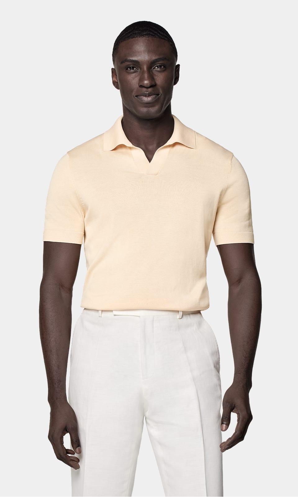 Shop the buttonless polo