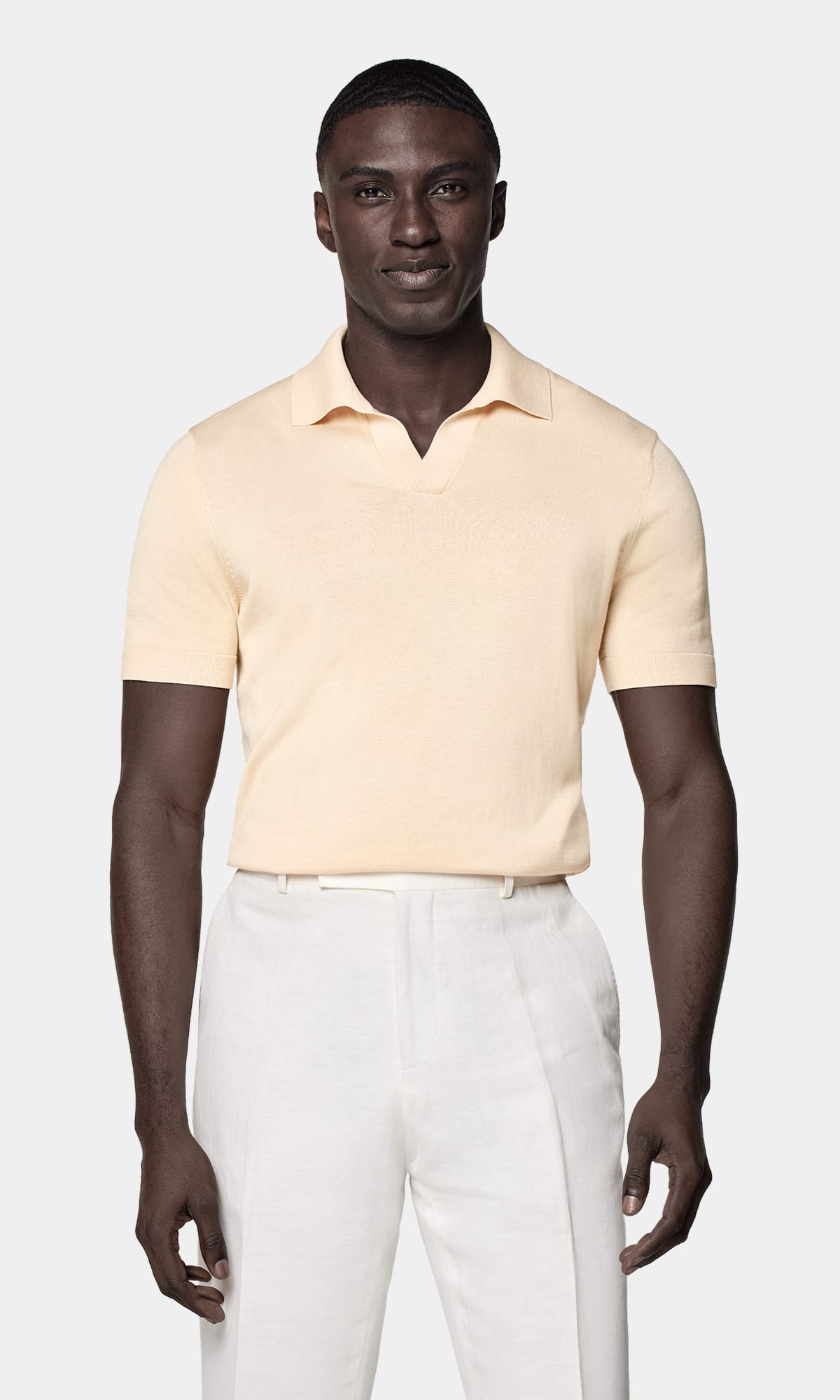 Shop the buttonless polo